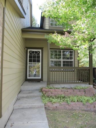 Exterior of home with shed